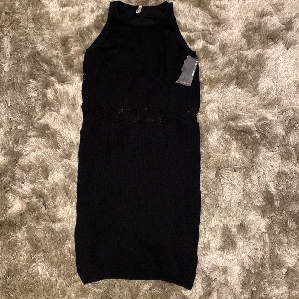 Black bodycon mini dress.